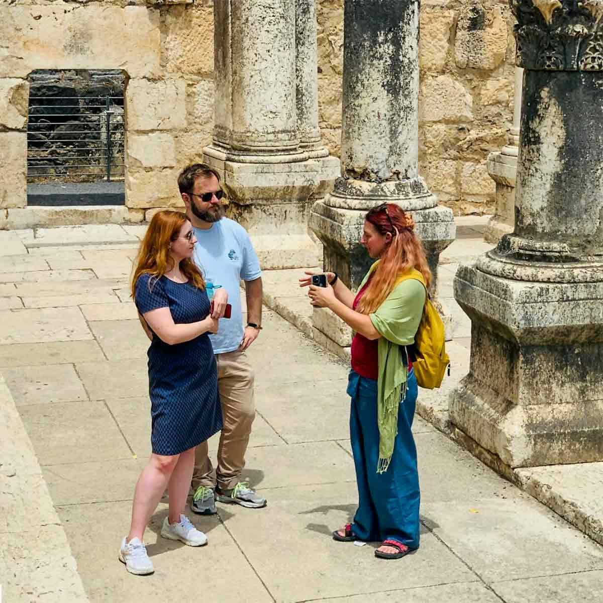 Missionary talking with couple–Israel