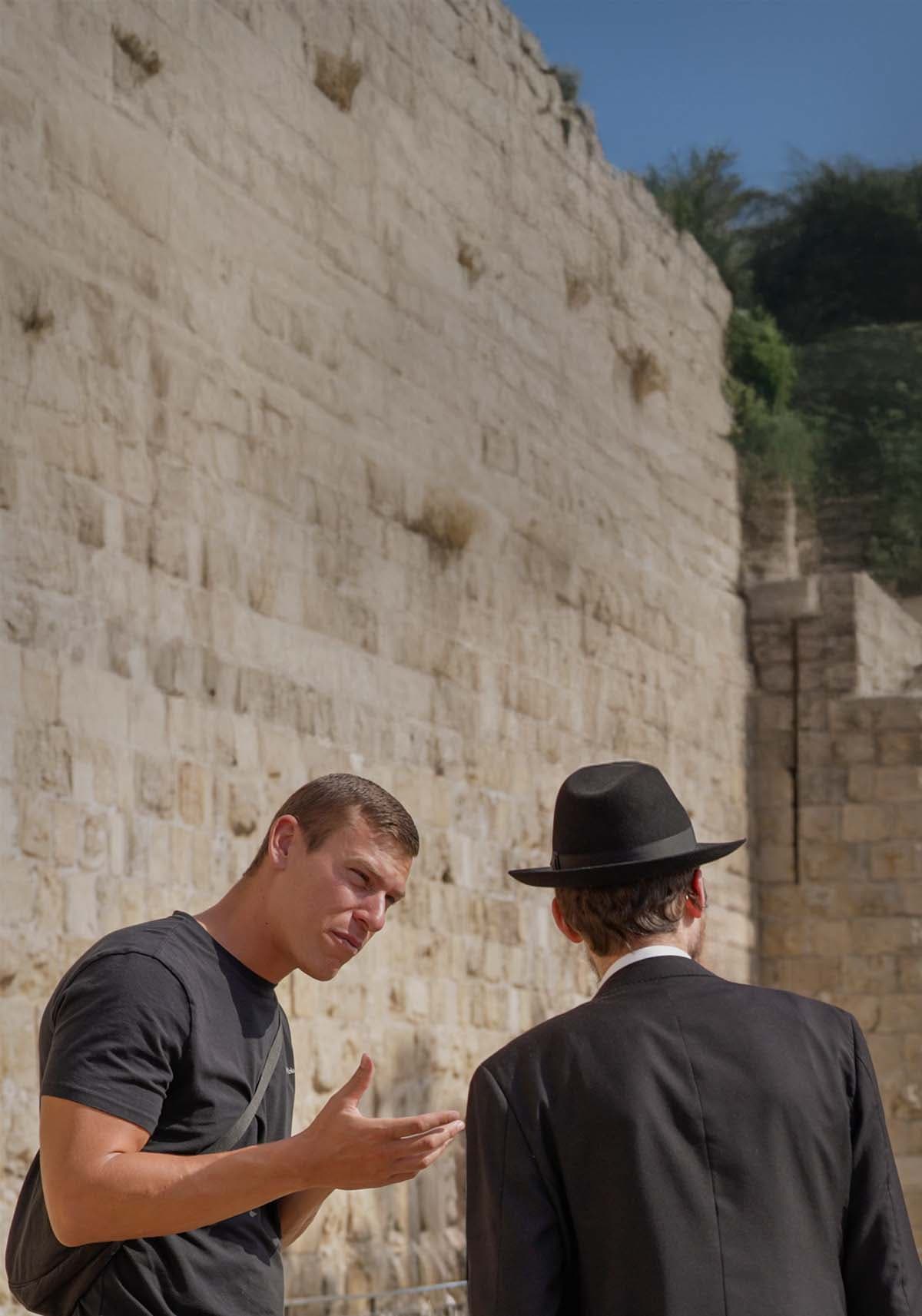 Jewish men having conversation on the street