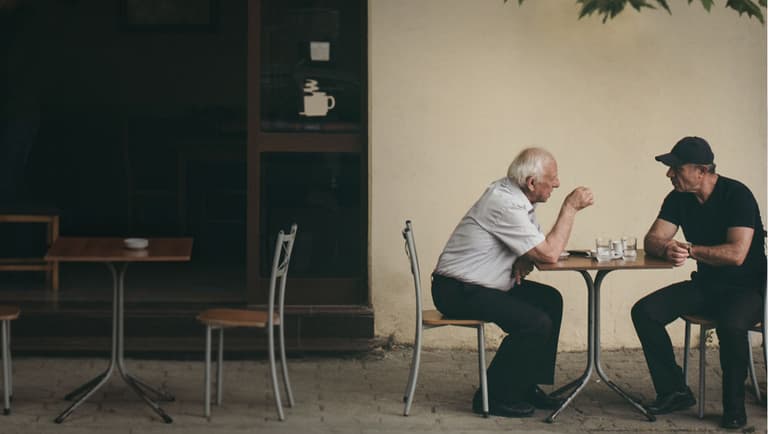 Two men talking