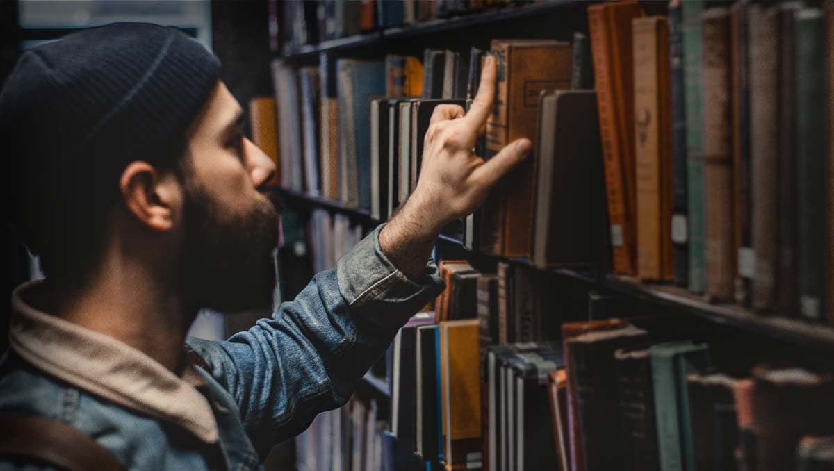 Jewish man searching in Library