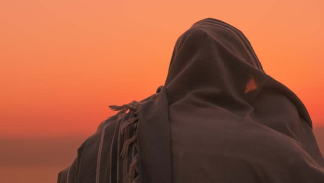 man in an oriental cloak