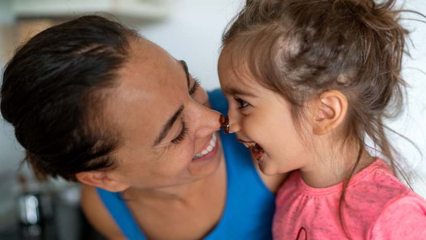 Joyful mother and daughter