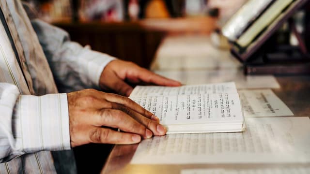 Man reading Siddur