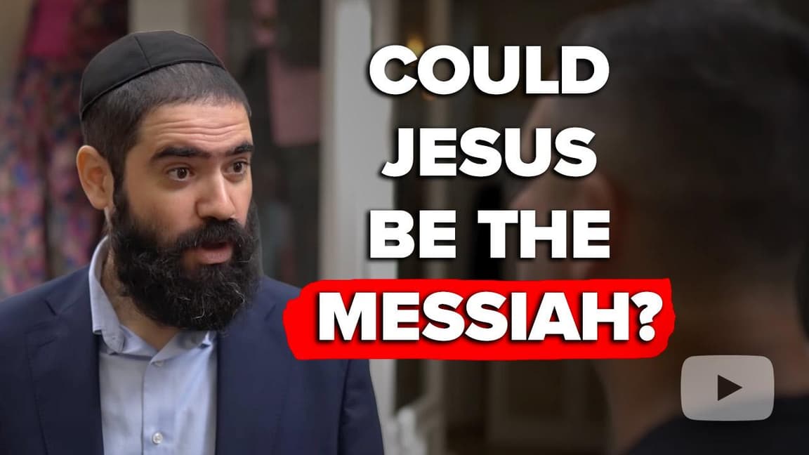 Orthodox Jewish man talks with Messianic Jewish man