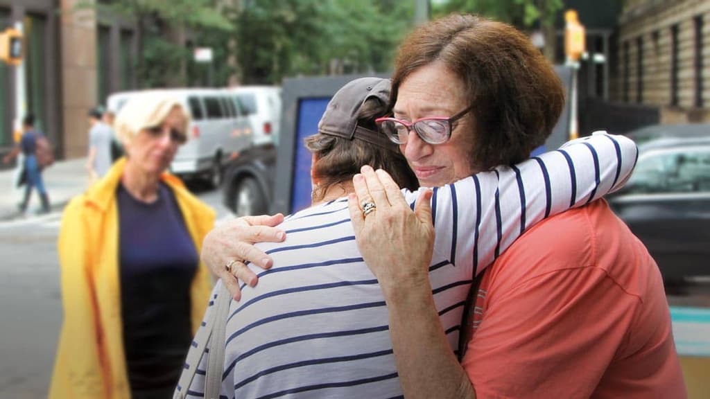 Lady giving a hug