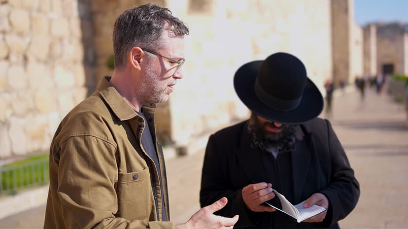 Messianic jewish man talking with orthodox jewish man about the new testament