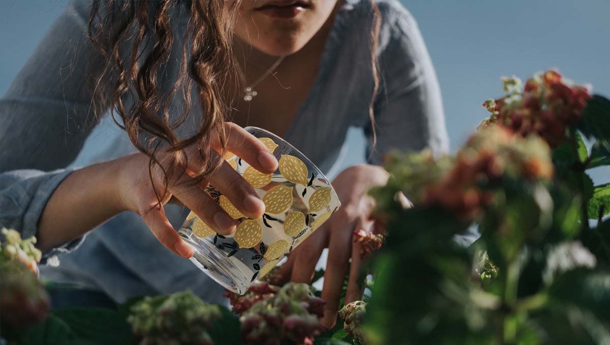 Woman watering flowers