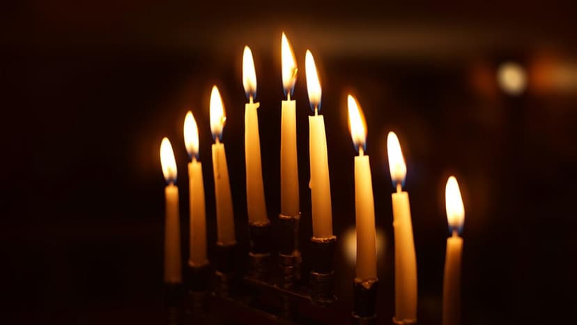 Hanukkah lighting on a dark room