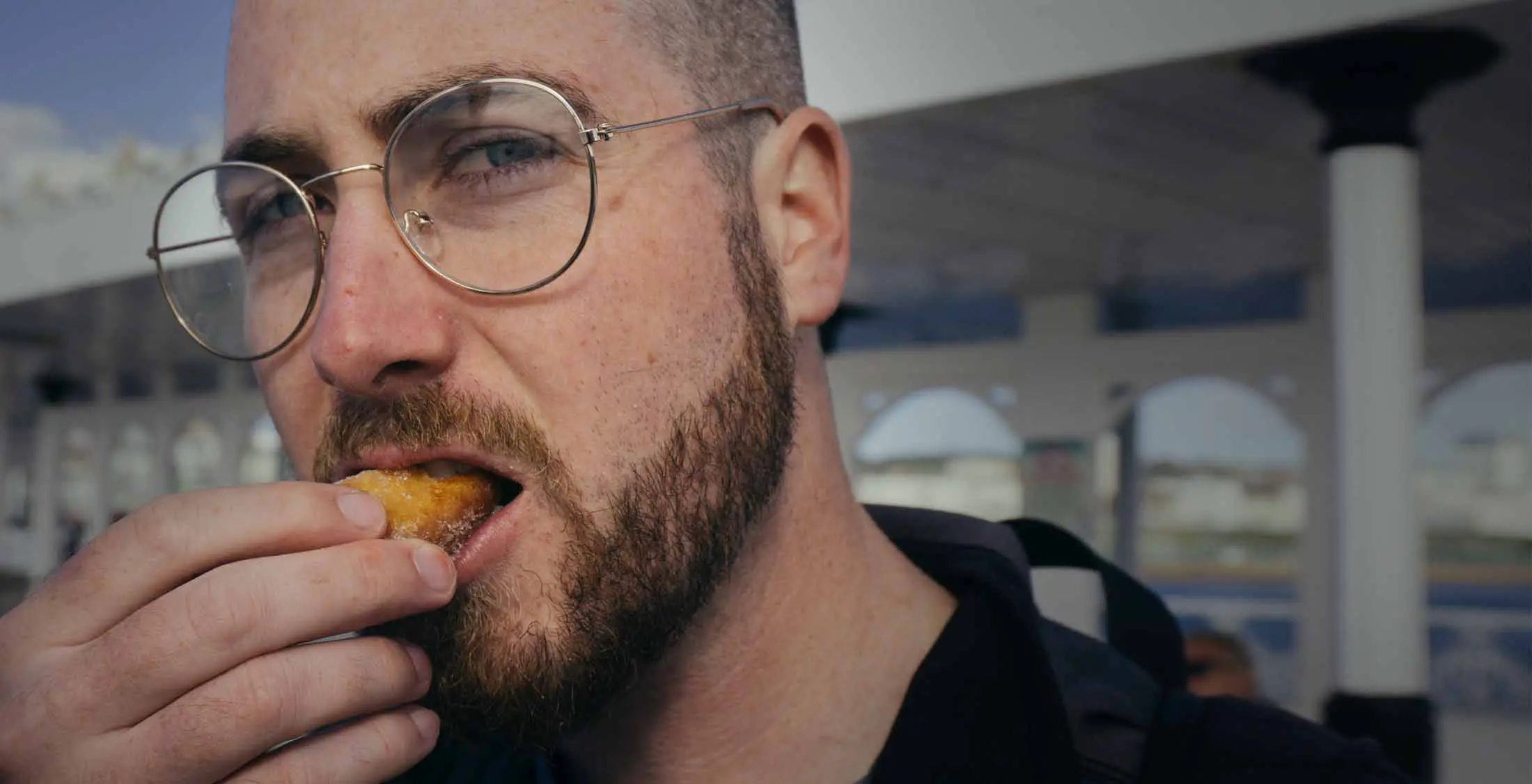 a man eating a fruit