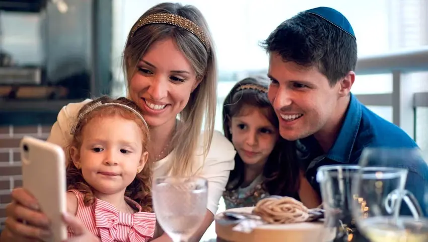family at celebratory table