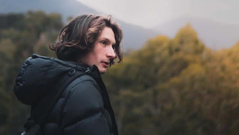 a young man hiking