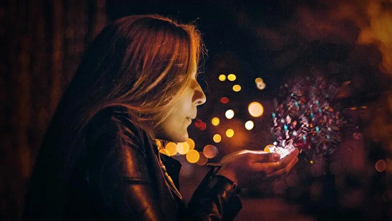 a young woman and sparks