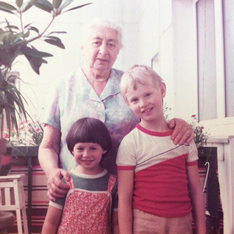 Adel with her grandmother and brother
