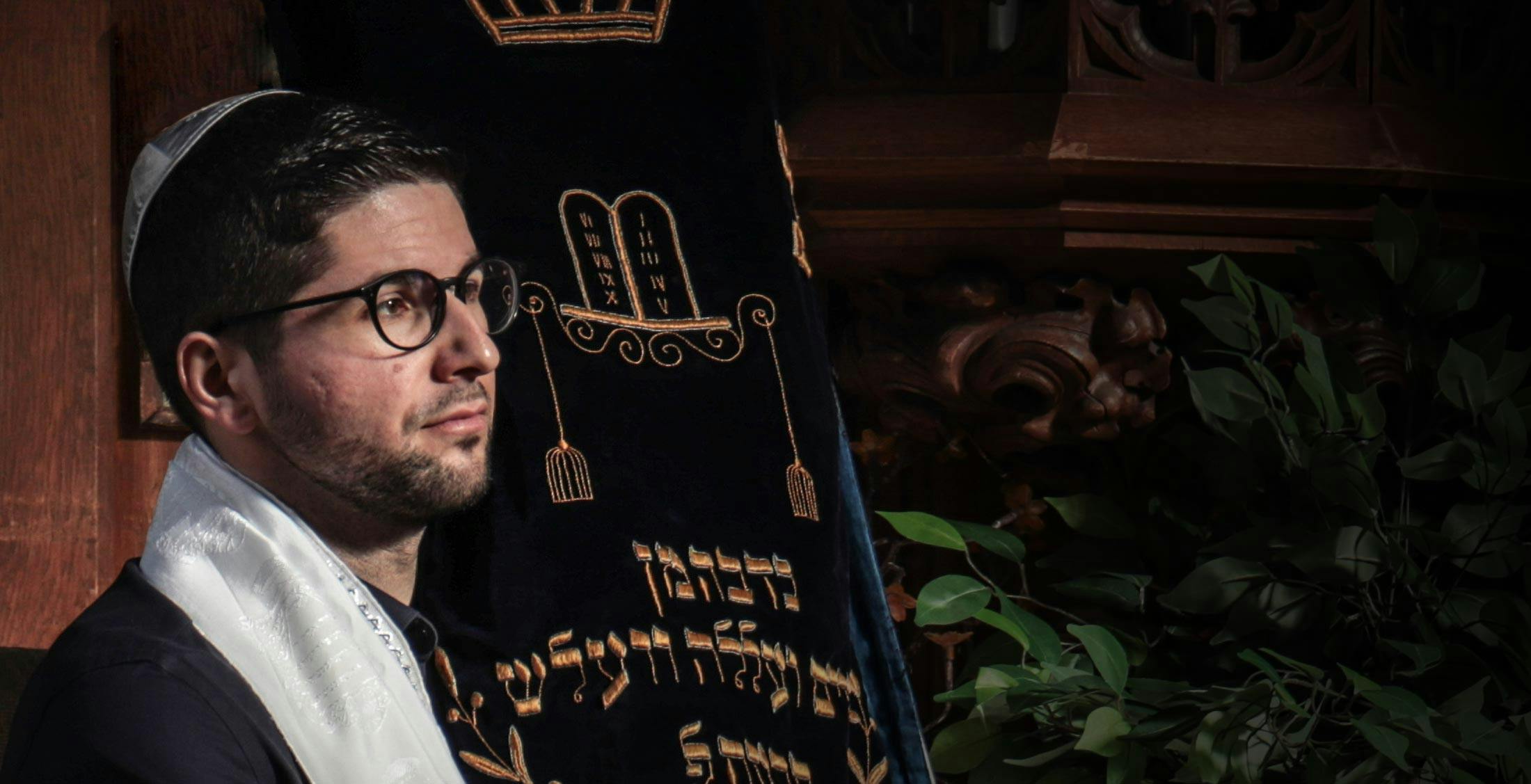 Jewish man in synagogue service.